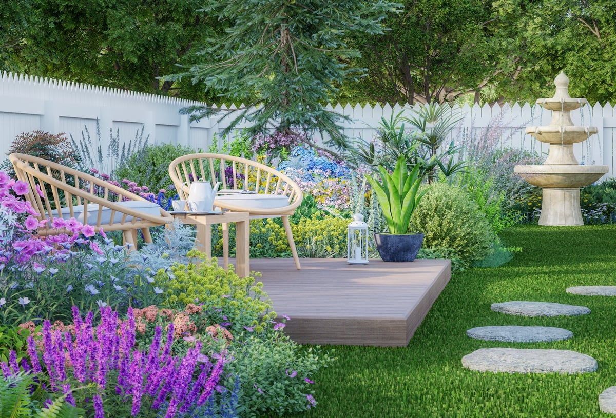 Wooden chairs on the plank terrace in the luxury colorful backyard garden 3d render with green lawn variety color of flowers and white wood fence with morning sunlight