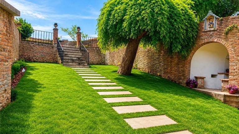 Lush green garden courtyard with stepping stone path, brick walls, large tree, and archway entrance under blue sky